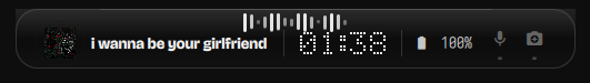 The collapsed pill showing cover art, track title, pixel clock, battery and device indicators